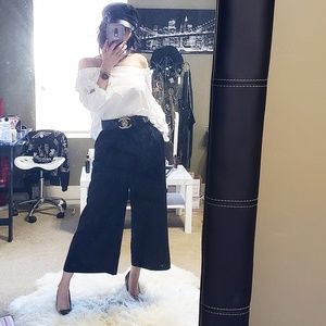 Jumpsuit with open back and wide leg trousers